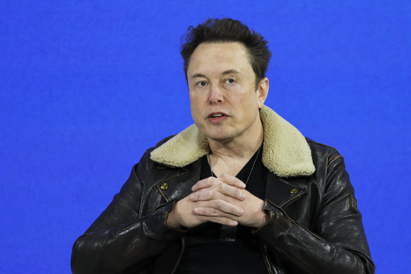 Elon Musk says he won't vote for Biden over Trump