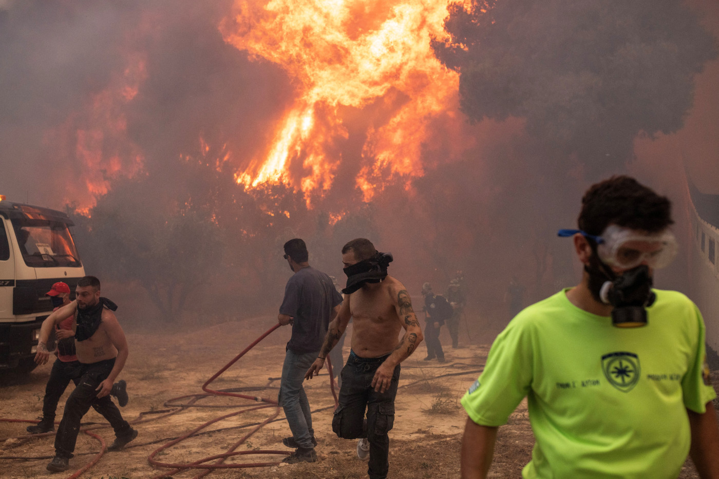 Firefighters in Greece struggle to contain wildfire near Athens