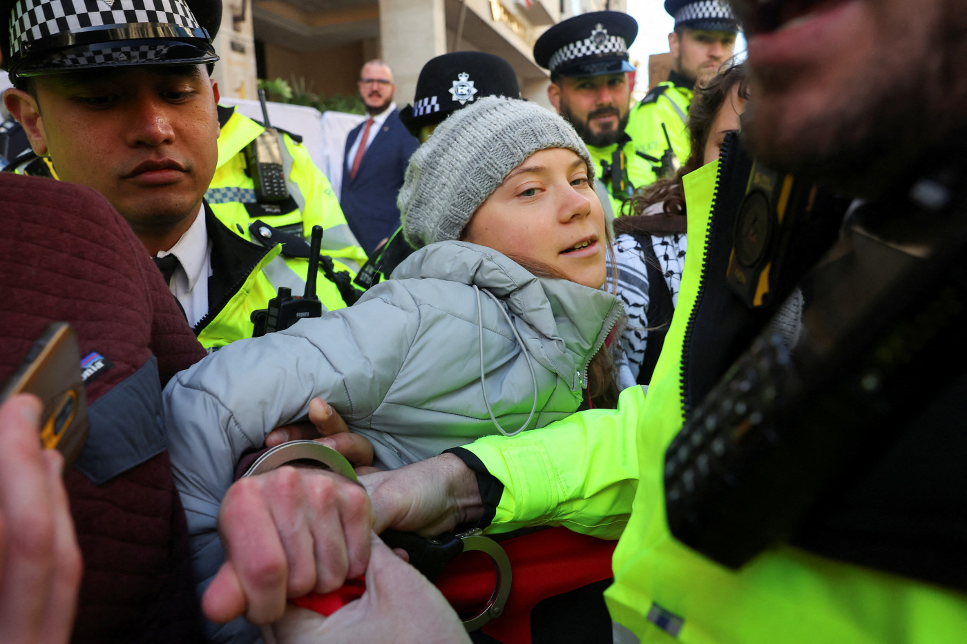 Police detain climate activist Greta Thunberg at London protest