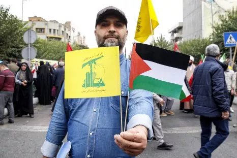 Hezbollah and Israel Exchange Fire as Iran Warns Hamas War Could Expand