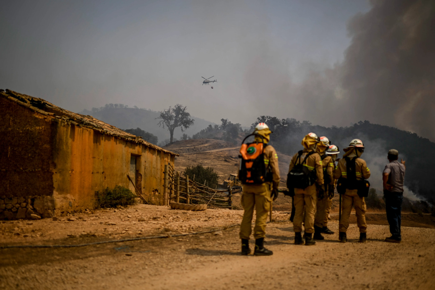 More than 1,000 evacuated in southern Portugal as wildfires rage