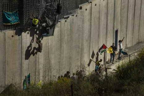 Fact Check: Did Hamas Backers Climb Israeli Border Wall for 'Day of Jihad'?