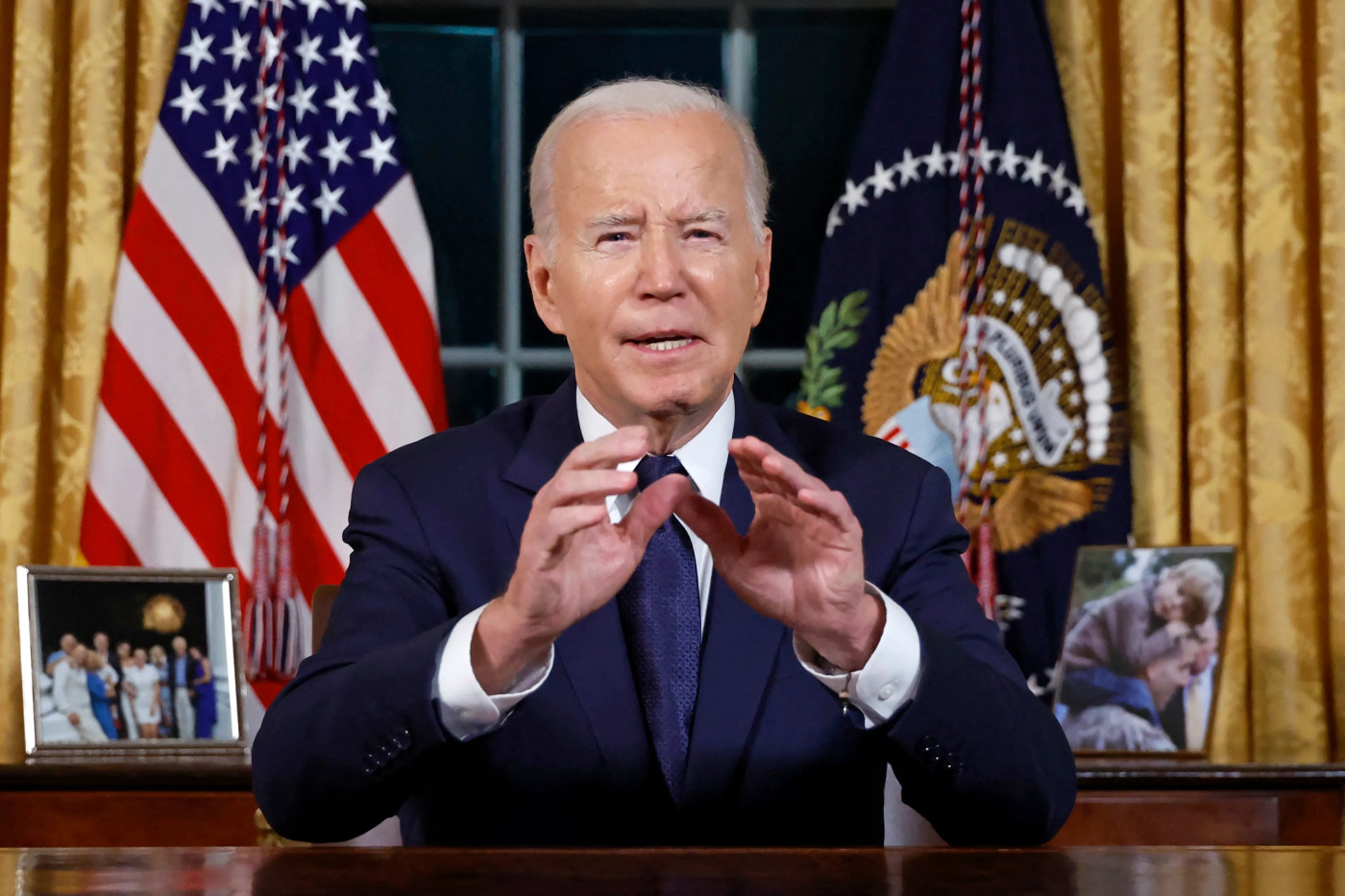 Biden says US ‘holds world together’ as he condemns Putin and Hamas