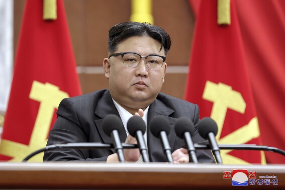 North Korea’s Kim says he’ll launch 3 more spy satellites and build more nuclear weapons in 2024