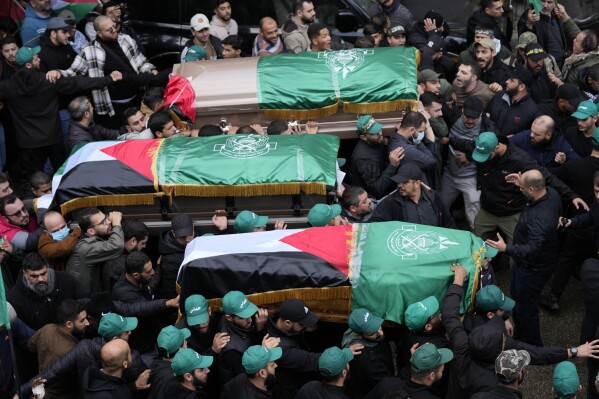 Thousands attend the funeral of a top Hamas official killed in an apparent Israeli strike in Beirut