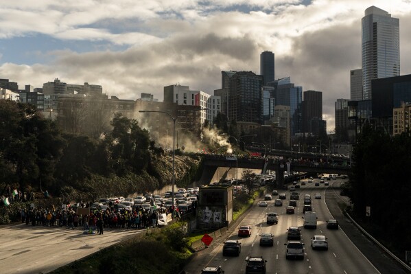 Protesters calling for cease-fire in Israel-Hamas war block freeway in Seattle for several hours