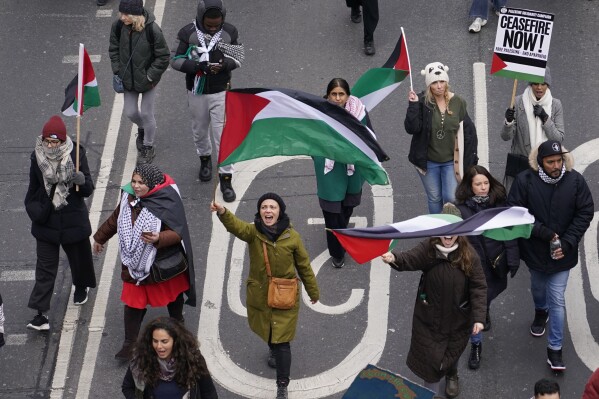 A global day of protests draws thousands in London and other cities in pro-Palestinian marches