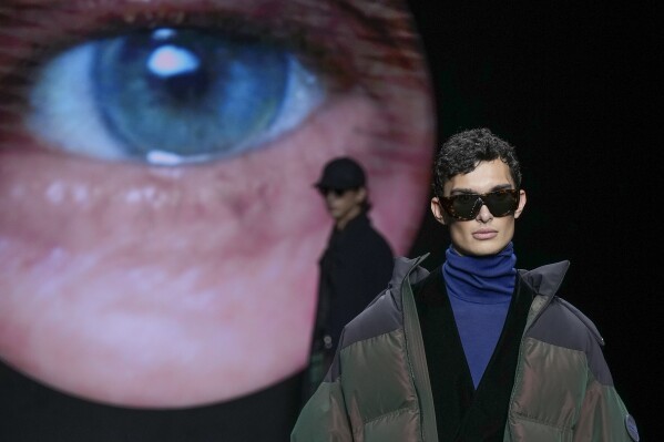 MILAN FASHION PHOTOS: Armani casts an arresting gaze on Milan runway menswear collection