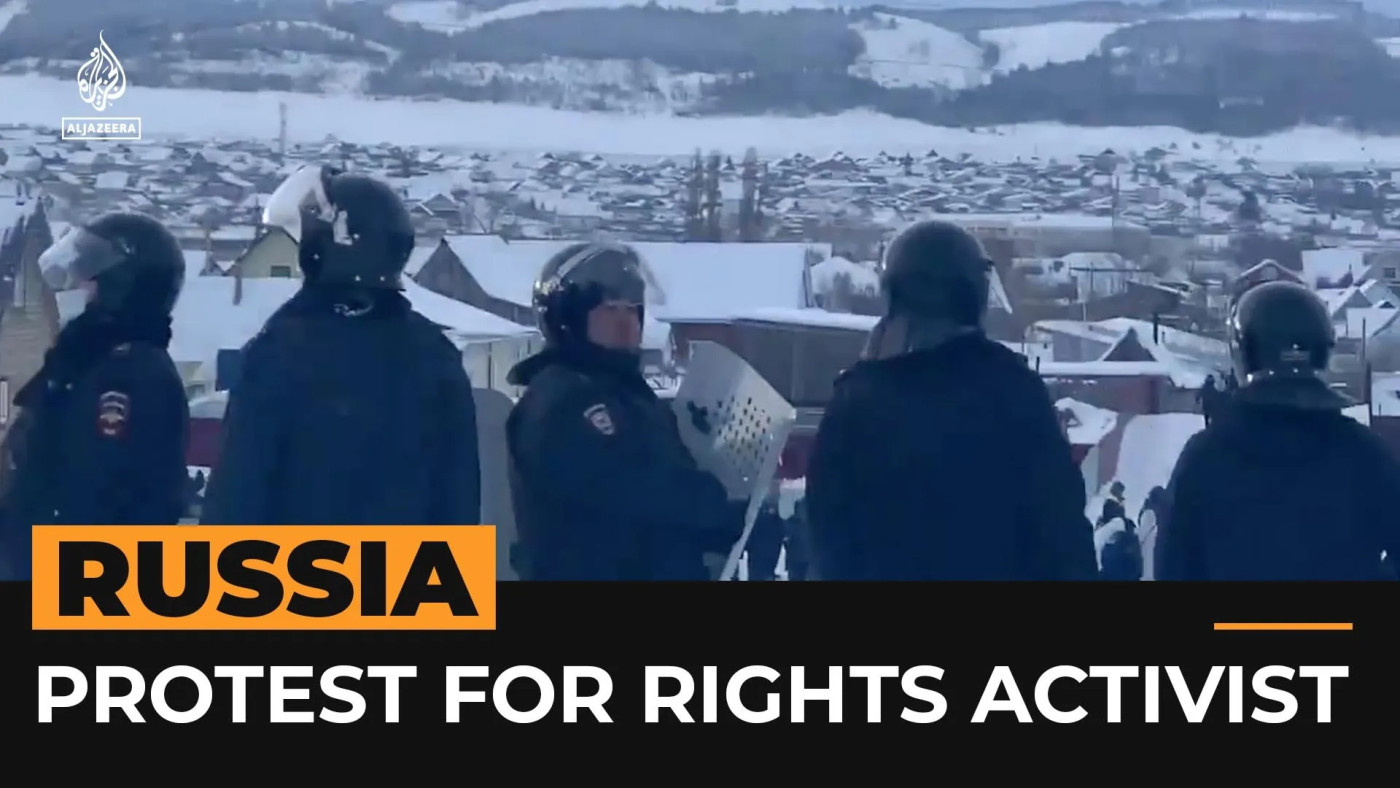 Russia hands down criminal charges following rare large protest