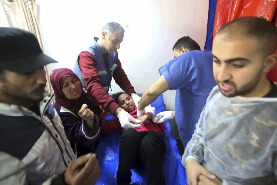 Gaza’s Health Ministry blames Israeli troops for deadly shooting as crowd waited for aid