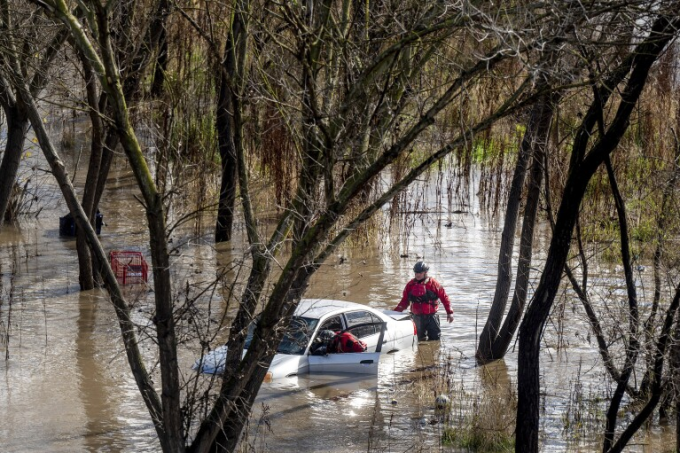 Second atmospheric river in days churns through California, knocking out power and flooding roads