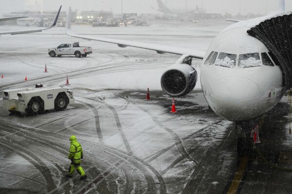 Winter storm hits Northeast, causing difficult driving, closed schools and canceled flights