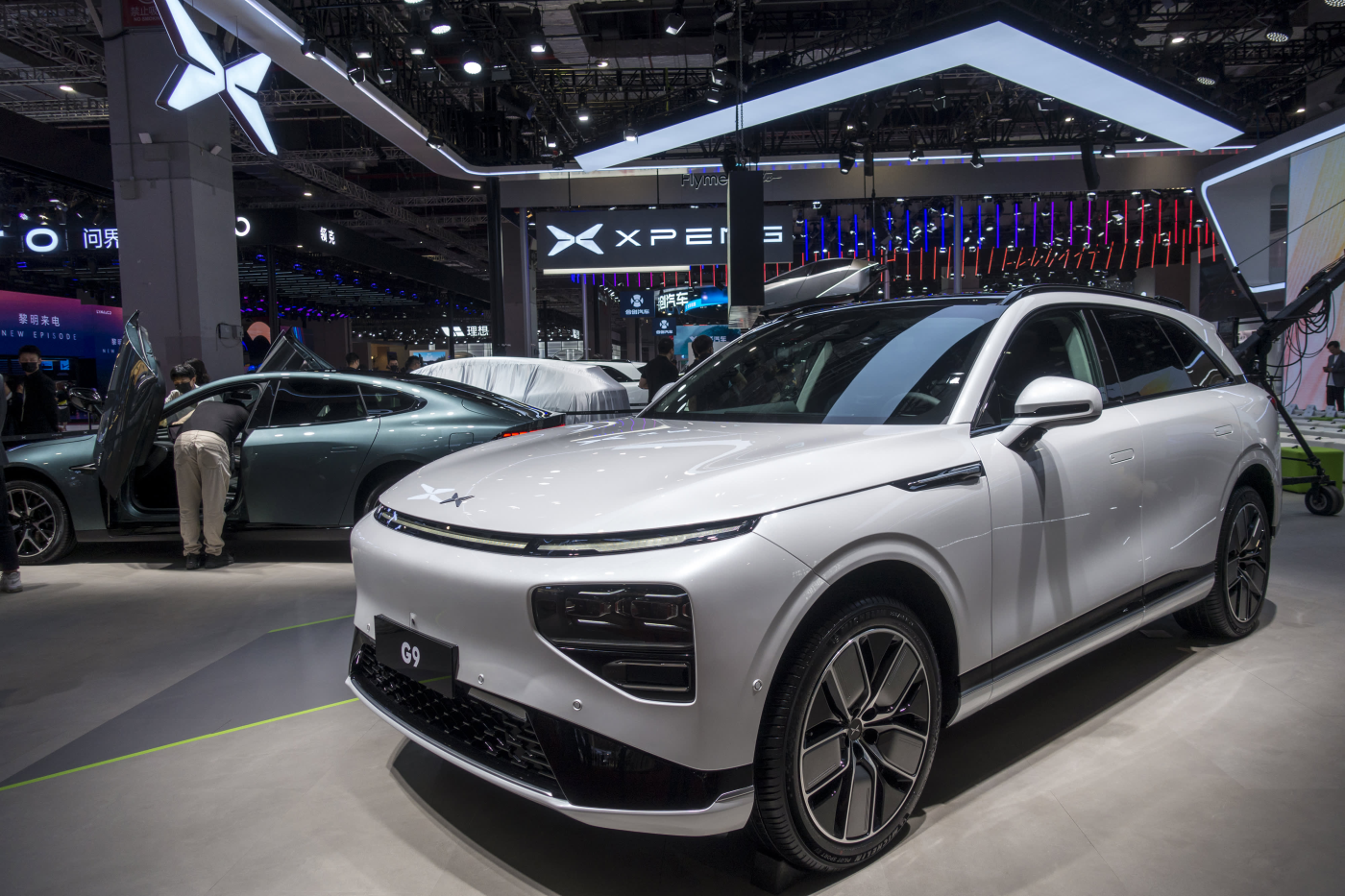 Xpeng plans to hire 4,000 people, invest in AI as CEO warns intense EV rivalry may end in 'bloodbath'