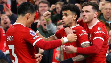 Football: Injury-plagued Liverpool put space on nearest English Premier League pursuers with win over Luton Town