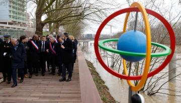 Paris Olympics: French President Emmanuel Macron opens athletes village with promise to swim in Seine