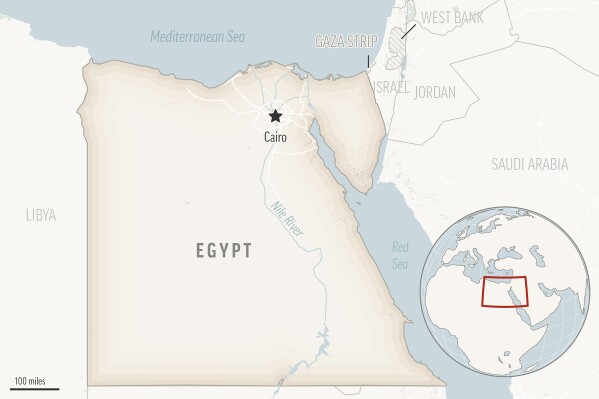 Cash-strapped Egypt allows its currency to fall sharply against dollar, hikes interest rates