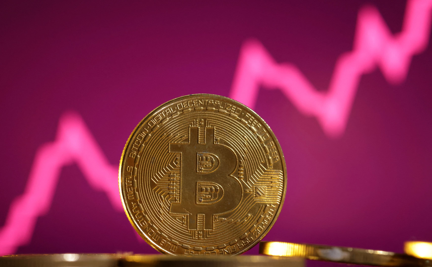 Bitcoin breaks $70,000 in volatile trading, hitting a new record to end the week