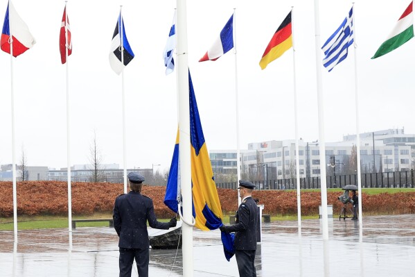 Sweden’s flag raised at NATO headquarters, cementing its place as the 32nd alliance member