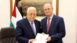 Palestinian leader appoints longtime adviser as prime minister in the face of calls for reform