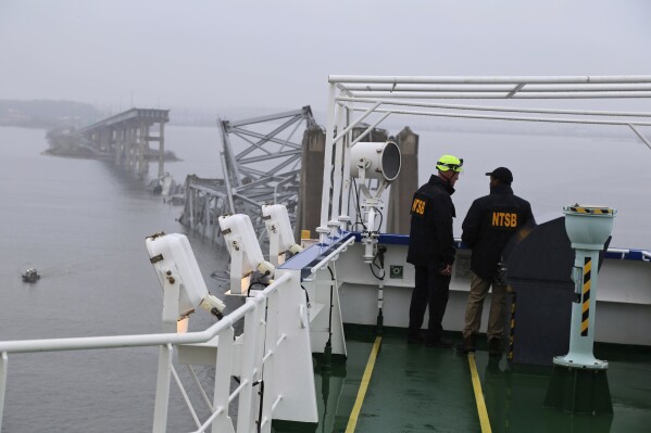 Cranes arriving to start removing wreckage from deadly Baltimore bridge collapse