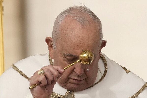 Pope overcomes health concerns to preside over a blustery Easter Sunday Mass in St. Peter’s Square