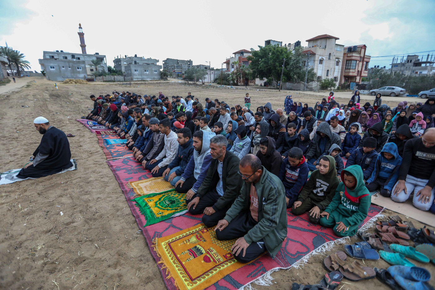 ‘Steadfast despite grief’: Palestinians in Gaza mark solemn Eid al-Fitr