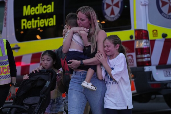 A man stabbed to death 5 people in a Sydney shopping center and was fatally shot by police