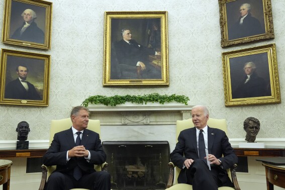 Biden hosts Romanian leader at the White House to celebrate NATO partnership