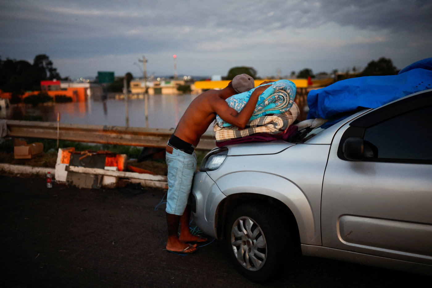 ‘Desperate’ rescues under way as Brazil floods kill 90, displace thousands