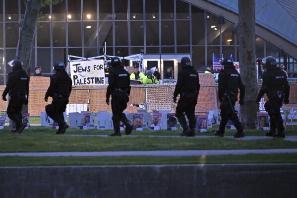 Police dismantle pro-Palestinian encampment at MIT and move to clear Penn and Arizona protests