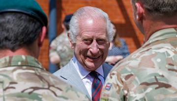 'I've been allowed out of my cage', King Charles jokes during visit