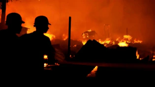 A fire burns down almost an entire shopping center housing 1,400 outlets in Warsaw