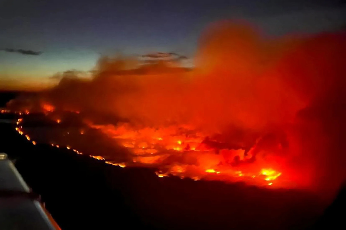 Thousands evacuate as wildfire grows ‘dramatically’ in western Canada