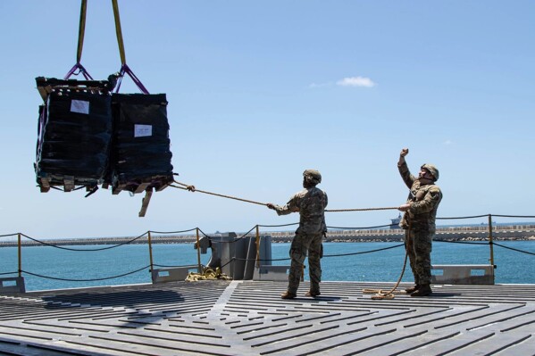 The Latest | U.S.-built pier begins carrying aid to Gaza