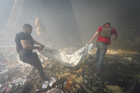 Russia smashes train tracks in a battered Ukrainian border region where children are being evacuated