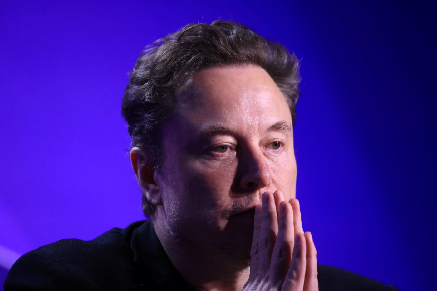 Elon Musk threatens to ban Apple devices from his companies over OpenAI partnership