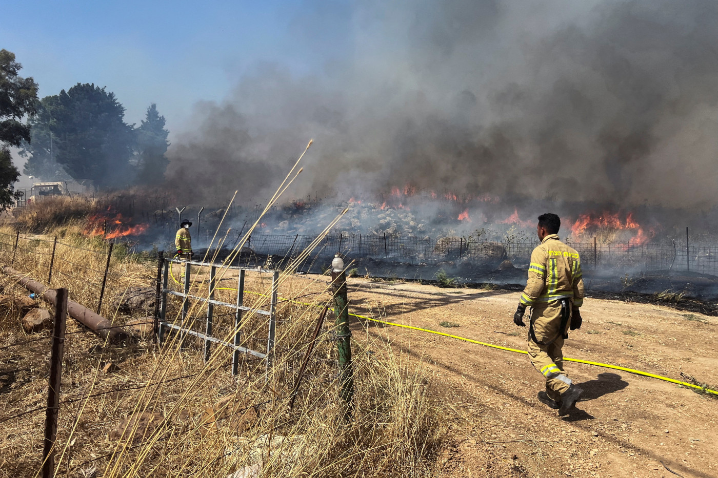 Hezbollah launches rockets, drones at northern Israel military sites