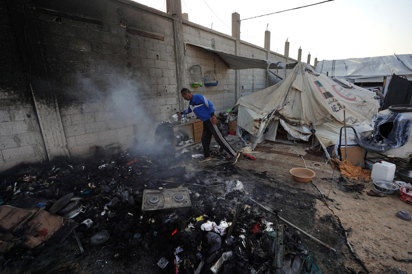 Israeli forces pound Gaza after al-Mawasi tent camp attack kills 25