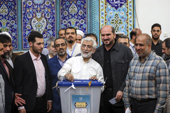 Iran seesawing vote results put race between reformist Masoud Pezeshkian and hard-liner Saeed Jalili