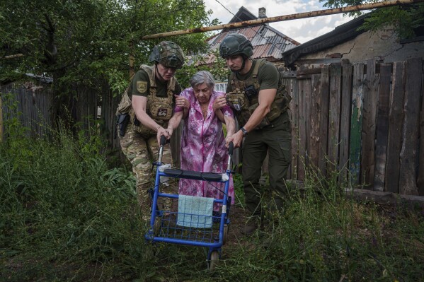 Russian shelling of Ukrainian front-line villages kills 4 and hits top floors of an apartment bloc