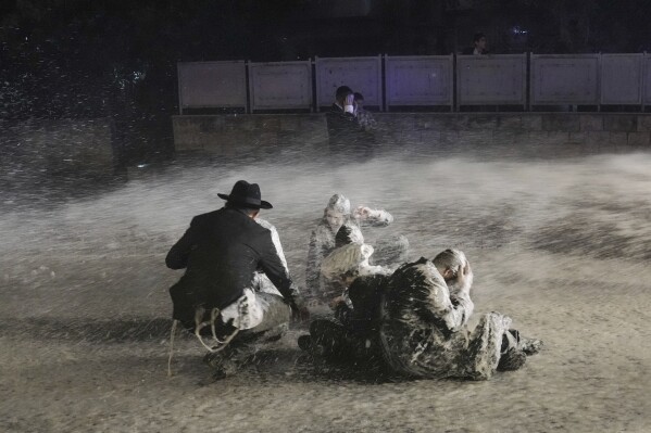 Ultra-Orthodox protest against order to enlist in Israeli military turns violent in Jerusalem