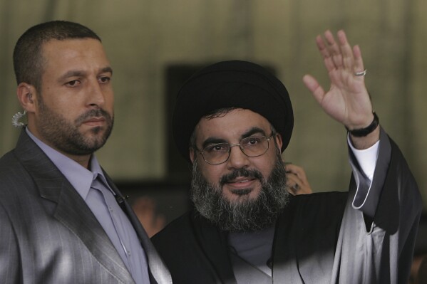 The Latest | Israeli strike kills the ex-bodyguard of Hezbollah’s top leader as tensions simmer