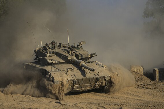 Israeli strikes across Gaza kill more than 30 as the sides weigh the latest cease-fire proposal