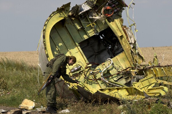 Relatives of those killed when MH17 was shot down mark 10 years since tragedy that claimed 298 lives