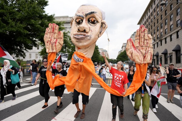 Gaza war protesters hold a ‘die-in’ near the White House as Netanyahu meets with Biden, Harris