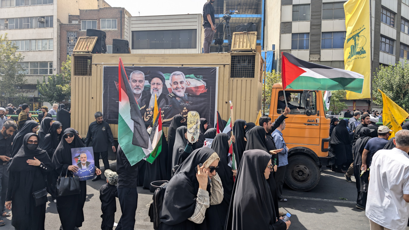 Thousands mourn Hamas leader Haniyeh in Iran amid calls for revenge