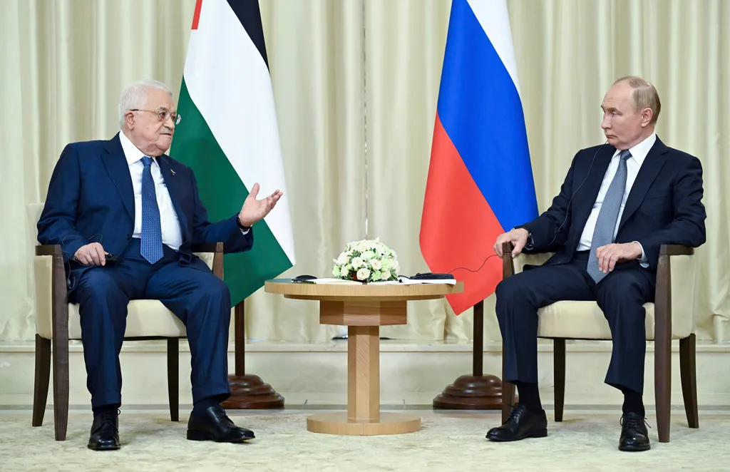 Putin expresses concern about civilian deaths in Gaza in meeting with Abbas