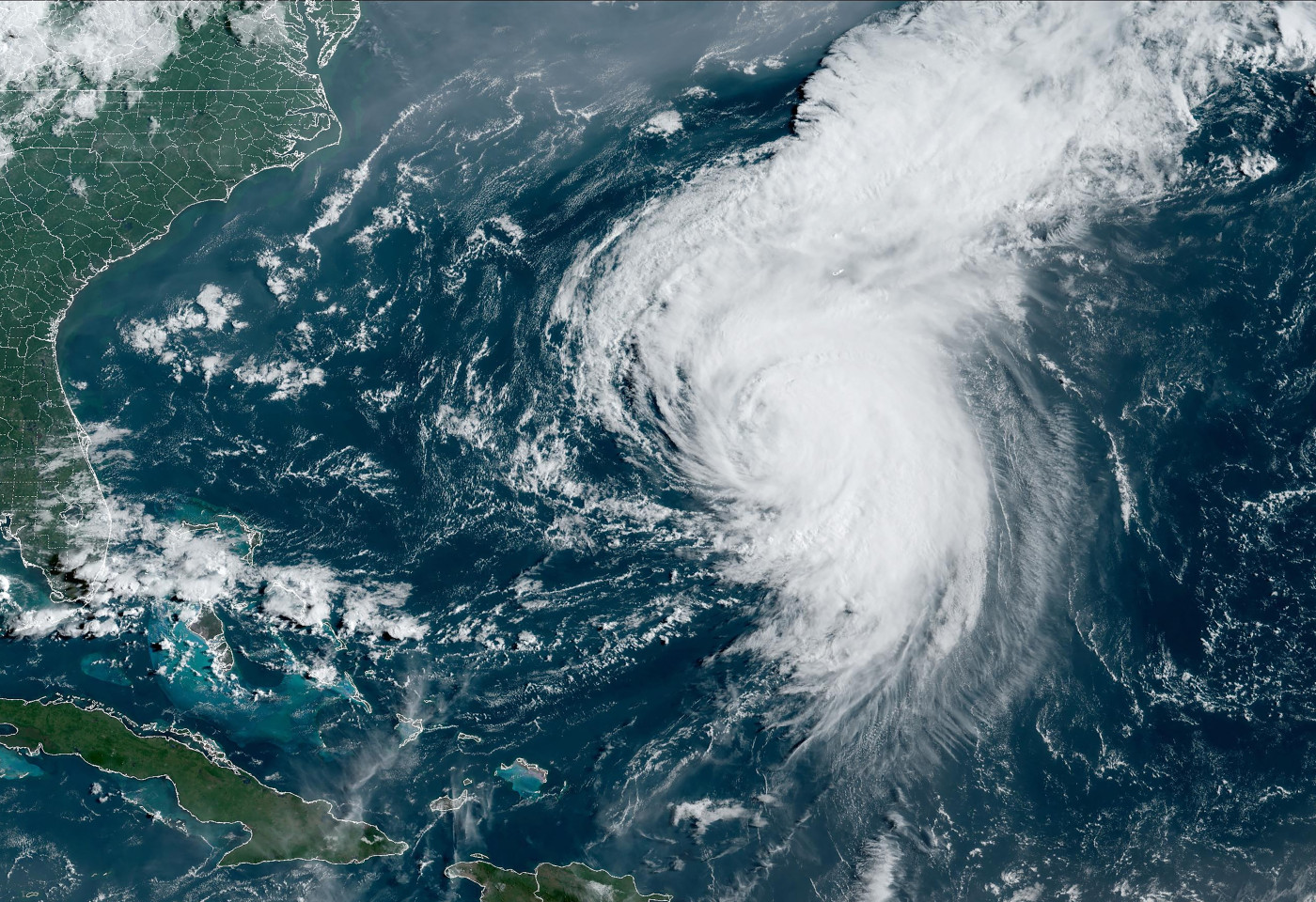 Hurricane Ernesto makes landfall in Bermuda as residents hunker down