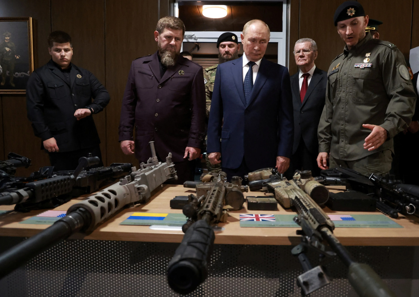 Putin inspects troops with Kadyrov on first Chechnya visit since 2011