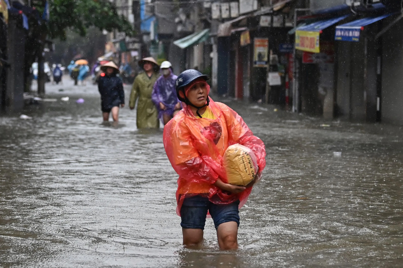 Thousands evacuated from Hanoi as Typhoon Yagi death toll climbs to 179